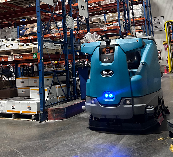 T16 AMR robot floor scrubber cleaning the food warehouse